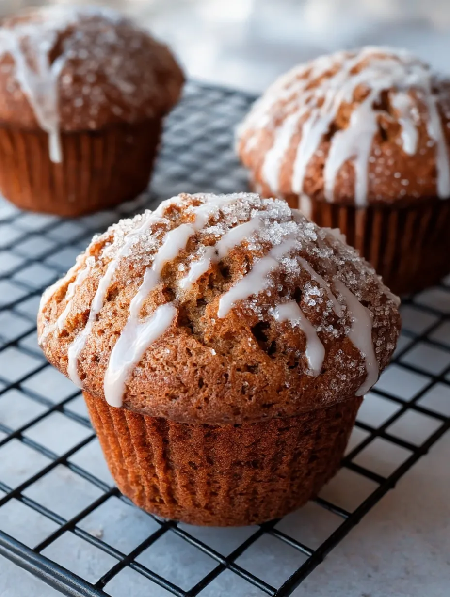 A muffin with a white glaze on top.