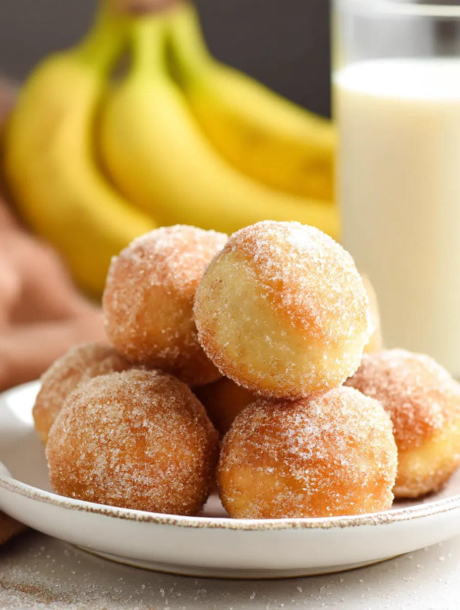 A plate packed with Banana Donut Holes.