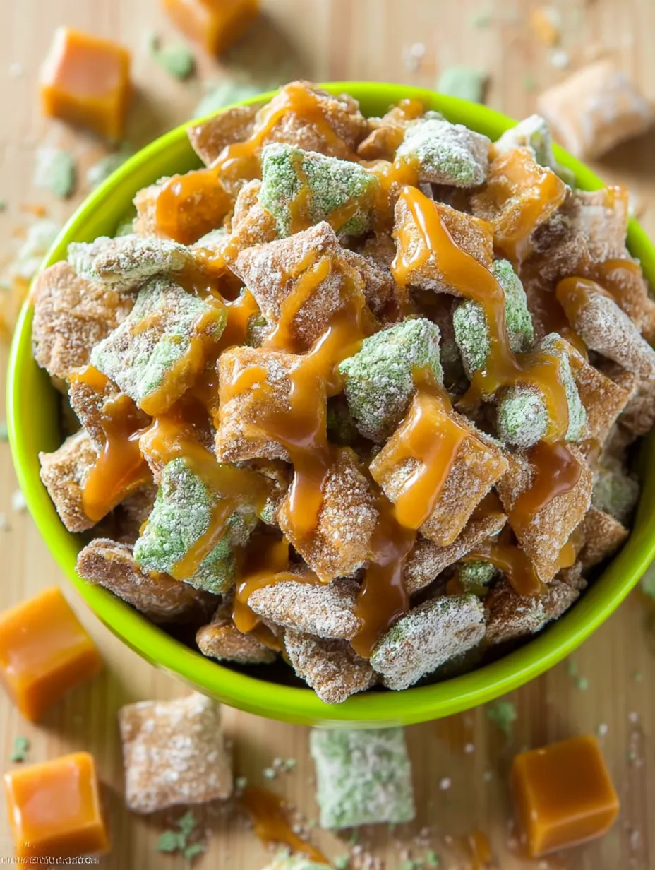 A simple bowl full of Caramel Apple Puppy Chow.
